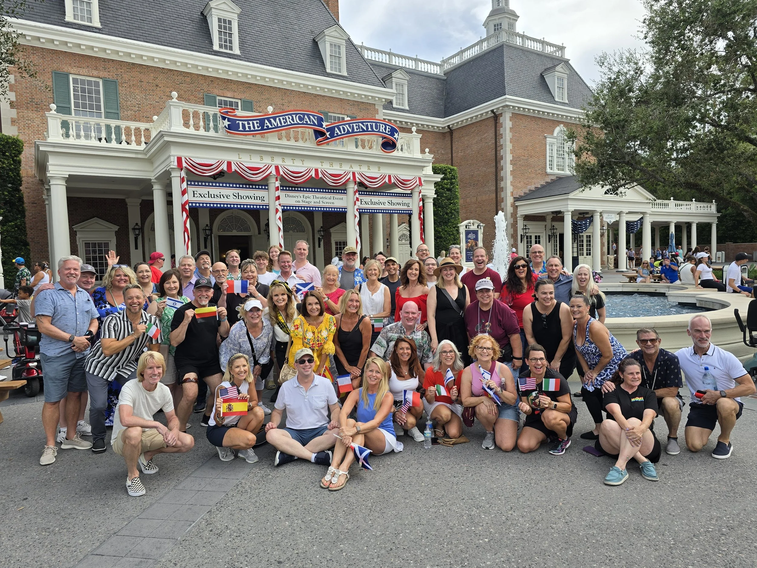 AACO alumni group picture at the American Gardens stage